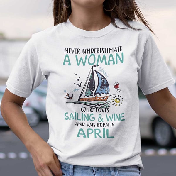 never underestimate a woman who loves sailing and wine shirt april