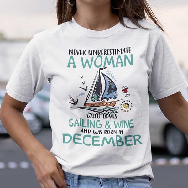 never underestimate a woman who loves sailing and wine shirt december