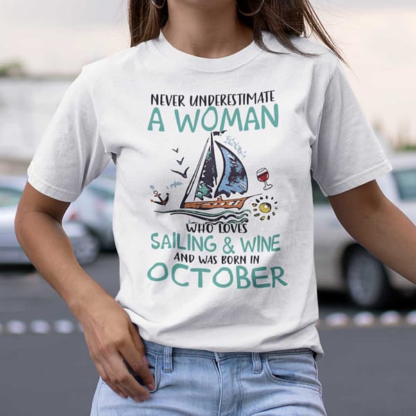 never underestimate a woman who loves sailing and wine shirt october