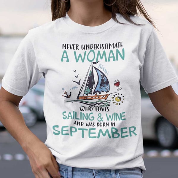 never underestimate a woman who loves sailing and wine shirt september