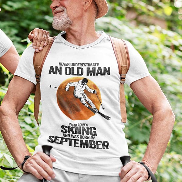 never underestimate an old man who loves skiing shirt september